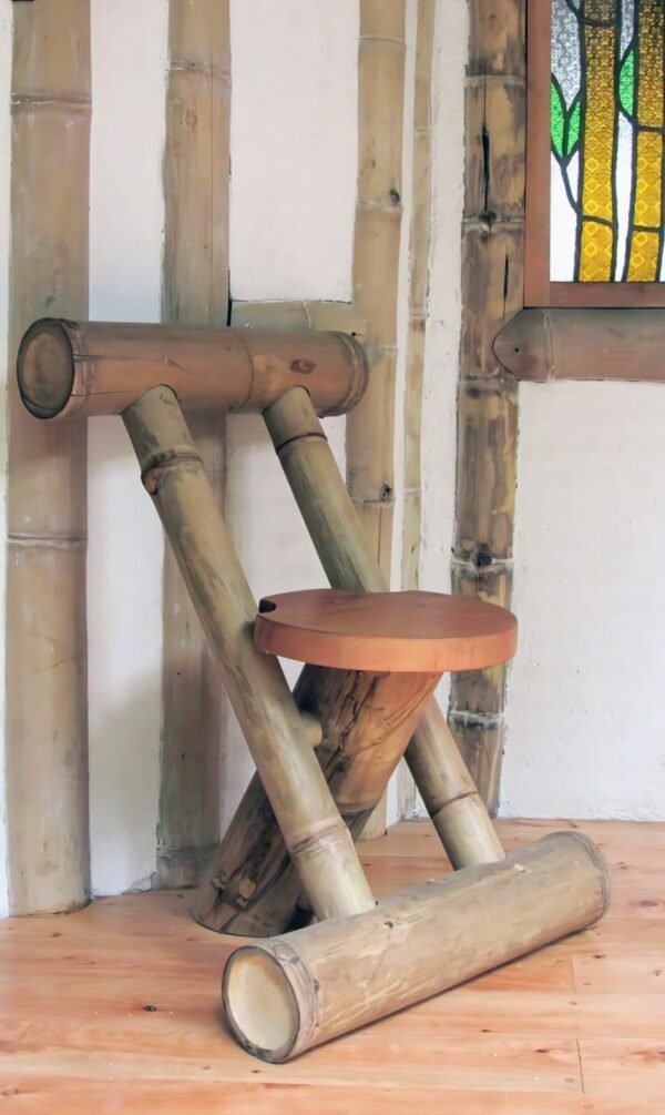 Handcrafted bamboo chair with a unique artistic design, eco-friendly and durable seating for home or office.